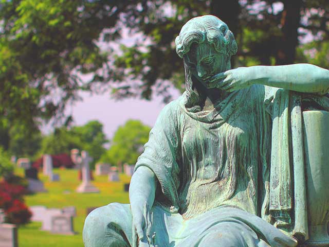 Photo of bronze female figure in Rock Creek Cemetery, credit Mr. T in DC