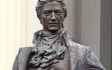 detail of statue of Treasury Secretary Alexander Hamilton outside U.S. Treasury headquarters