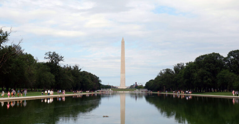 A view of the reflecting pool with the Washington Monument beyond